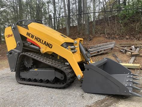 new holland c314 vs case tl tl100 skid steer spec|new holland c314 manual.